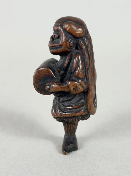 Netsuke of a Shishi Masked Child, Wood Japanese Edo 18th. Century