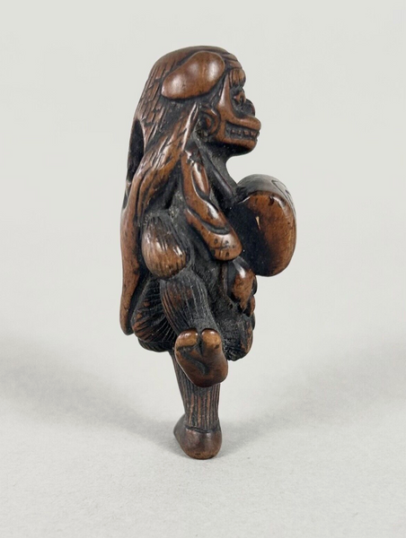 Netsuke of a Shishi Masked Child, Wood Japanese Edo 18th. Century