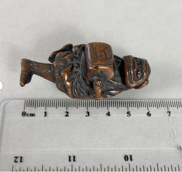 Netsuke of a Shishi Masked Child, Wood Japanese Edo 18th. Century